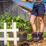 women standing in the yard wearing a pair of HISEA boots, doing gardening work